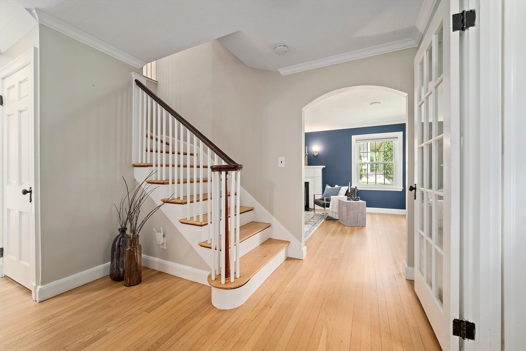 23 Regina Road Newton, MA 02466 - Photo 12 of 42 a view of entryway and hall with wooden floor
