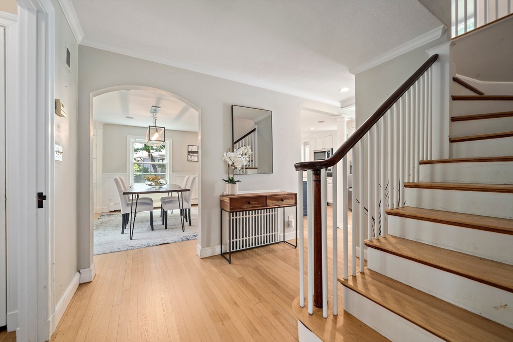 23 Regina Road Newton, MA 02466 - Photo 16 of 42 a view of entryway and hall with wooden floor