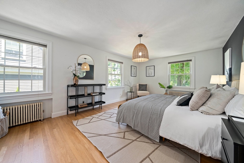 23 Regina Road Newton, MA 02466 - Photo 18 of 42 a bedroom with a bed and a window