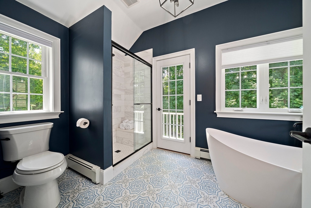 23 Regina Road Newton, MA 02466 - Photo 21 of 42 a bathroom with a toilet and a tub