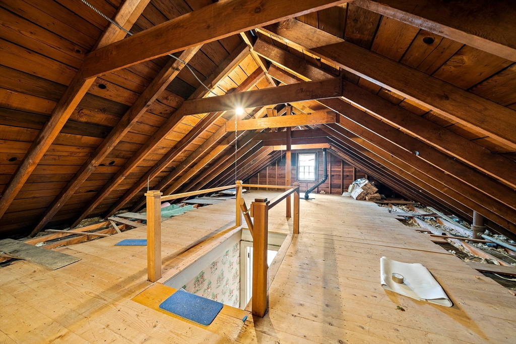 23 Regina Road Newton, MA 02466 - Photo 32 of 42 a roof deck with table and chairs