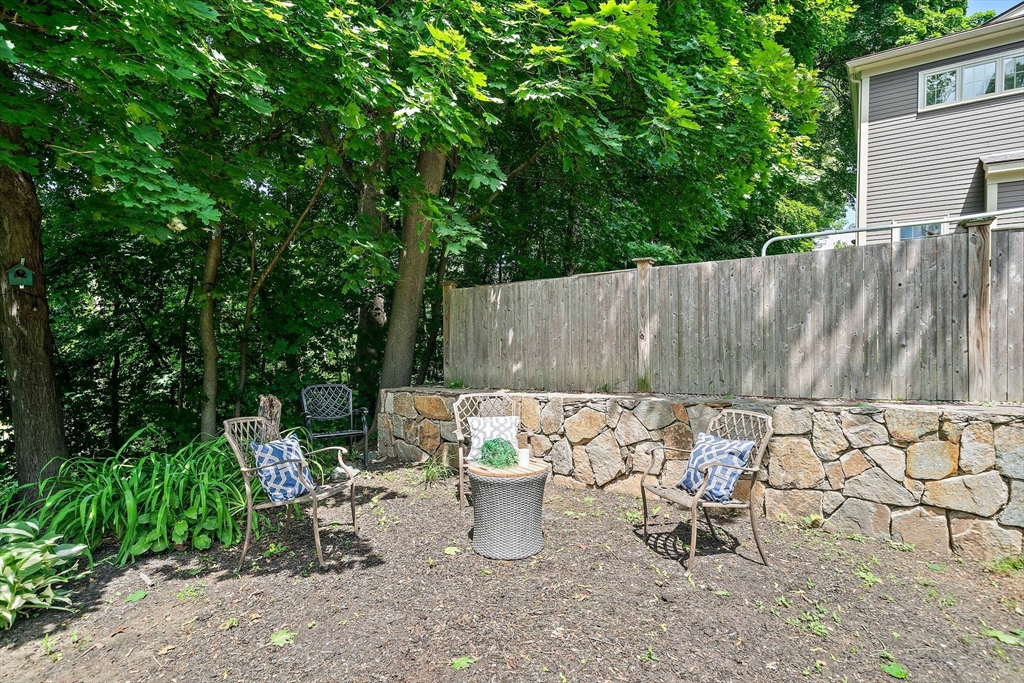 23 Regina Road Newton, MA 02466 - Photo 38 of 42 a view of outdoor space with table and chairs