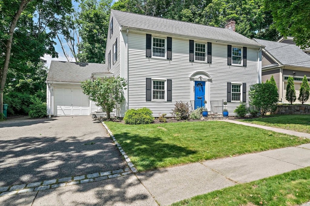 23 Regina Road Newton, MA 02466 - Photo 39 of 42 a front view of house with yard and green space