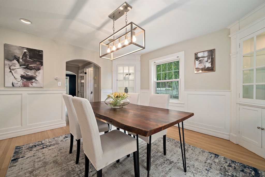 23 Regina Road Newton, MA 02466 - Photo 8 of 42 a view of a dining room with furniture window and wooden floor