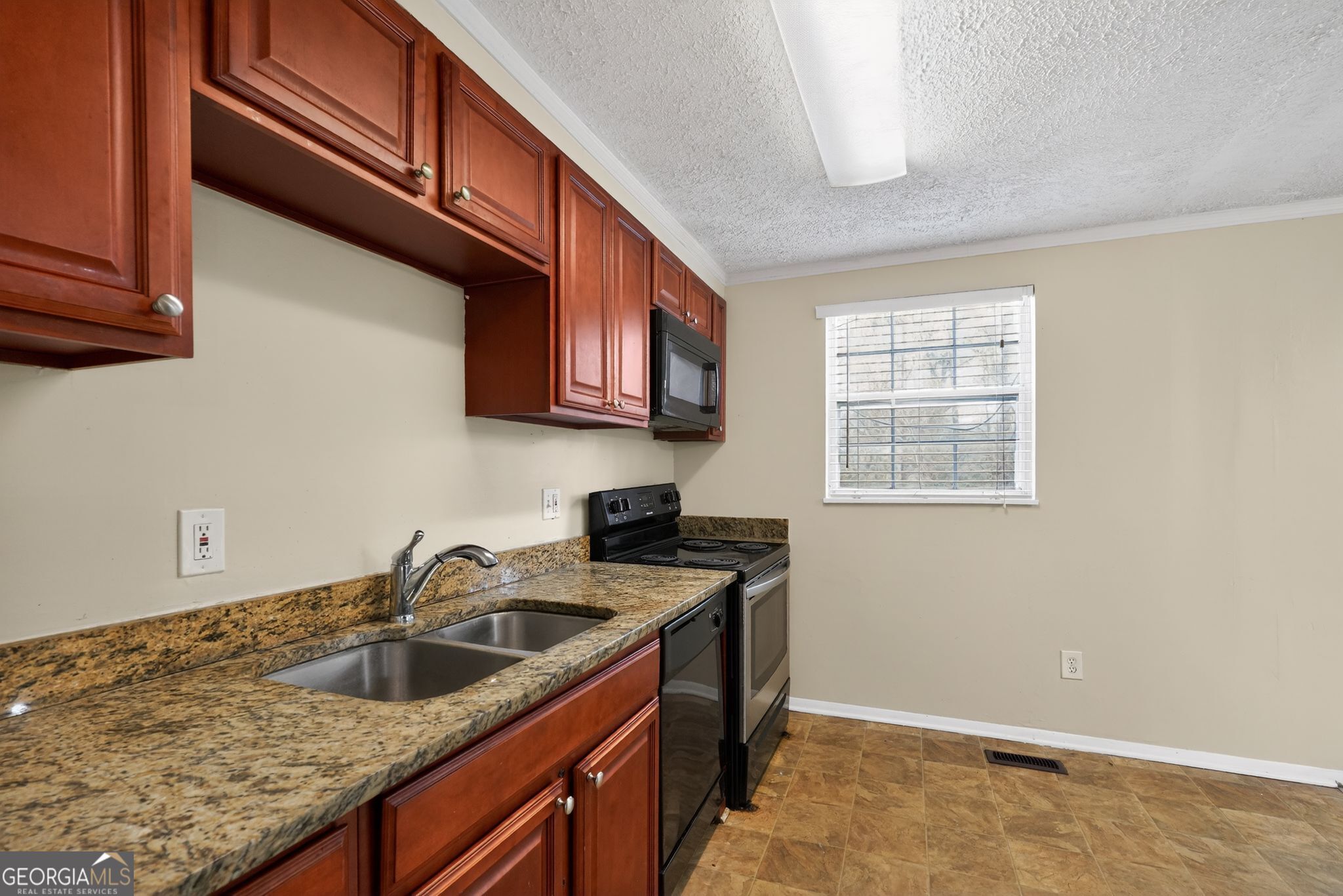 2977 Boring Ridge Drive Decatur, GA 30034 - Photo 11 of 34 a kitchen that has a sink and a stove
