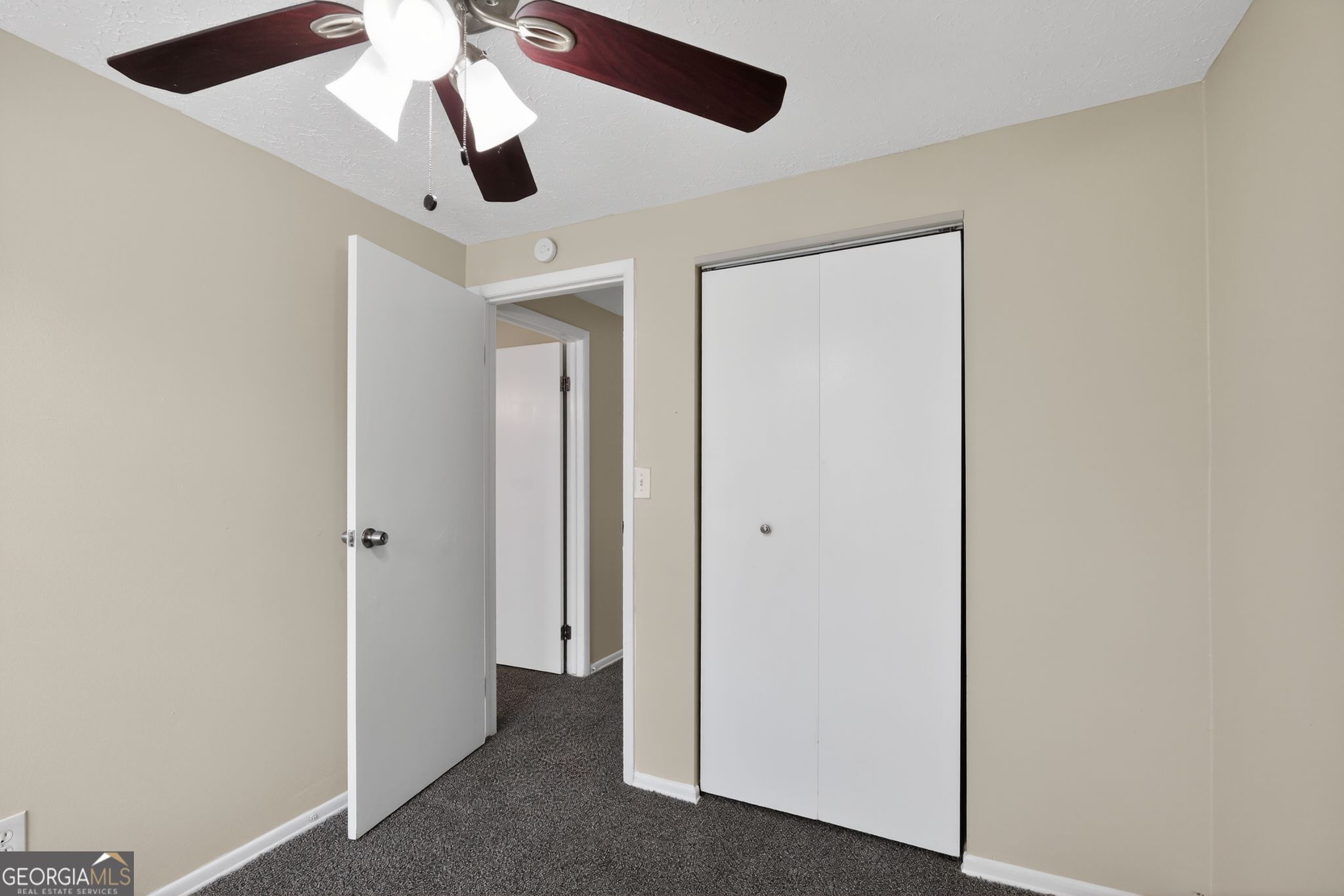 2977 Boring Ridge Drive Decatur, GA 30034 - Photo 20 of 34 an empty room with a ceiling fan and a fan