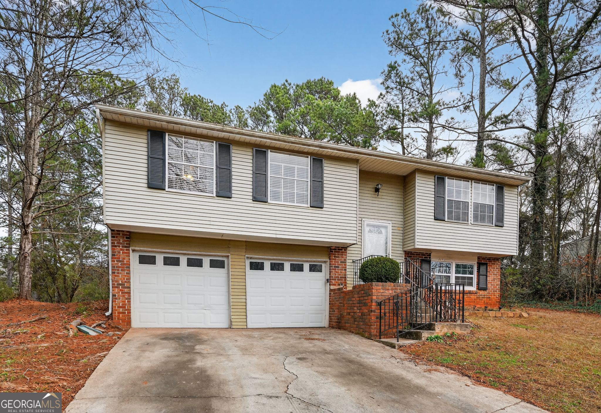 2977 Boring Ridge Drive Decatur, GA 30034 - Photo 2 of 34 a front view of a house with garden
