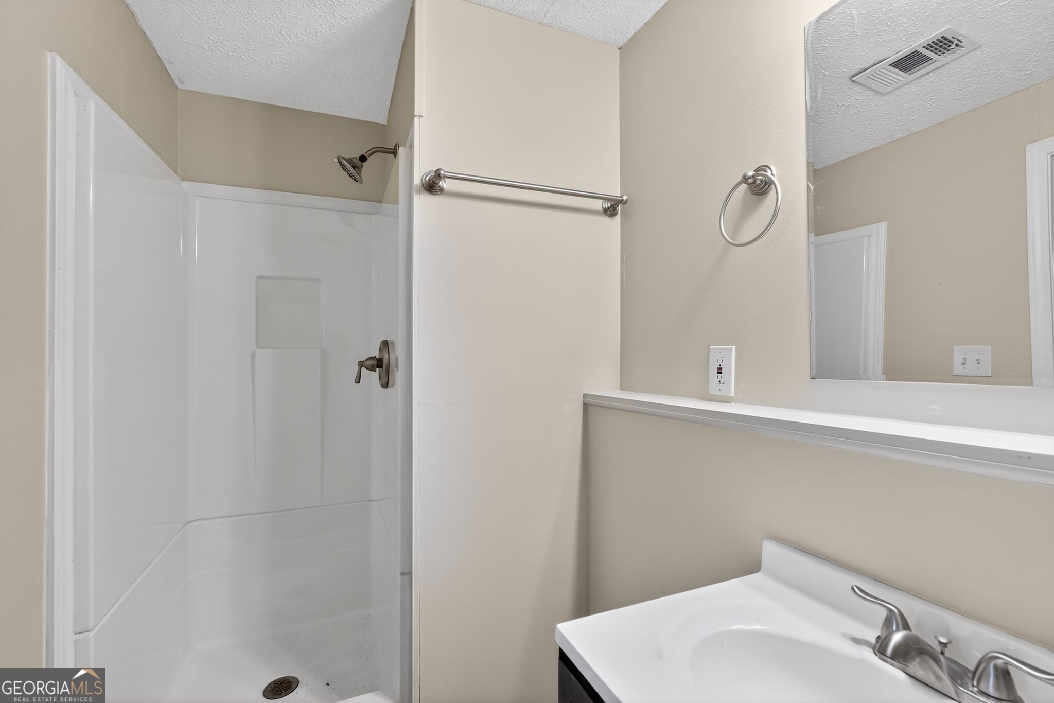 2977 Boring Ridge Drive Decatur, GA 30034 - Photo 24 of 34 a bathroom with a sink and shower
