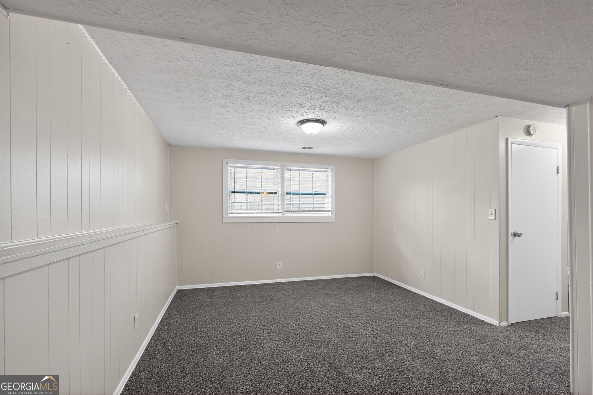 2977 Boring Ridge Drive Decatur, GA 30034 - Photo 25 of 34 a view of a big room with windows and closet
