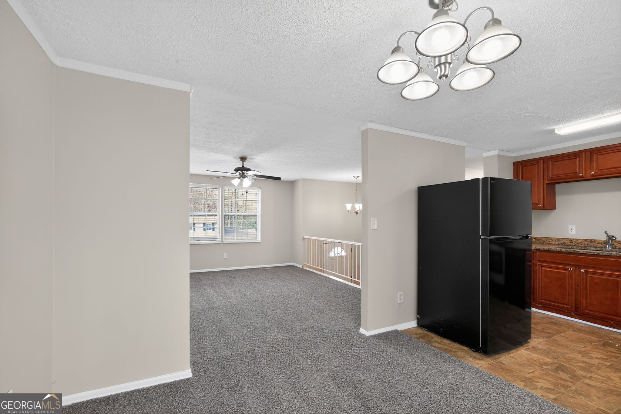 2977 Boring Ridge Drive Decatur, GA 30034 - Photo 7 of 34 a kitchen with a refrigerator and cabinets