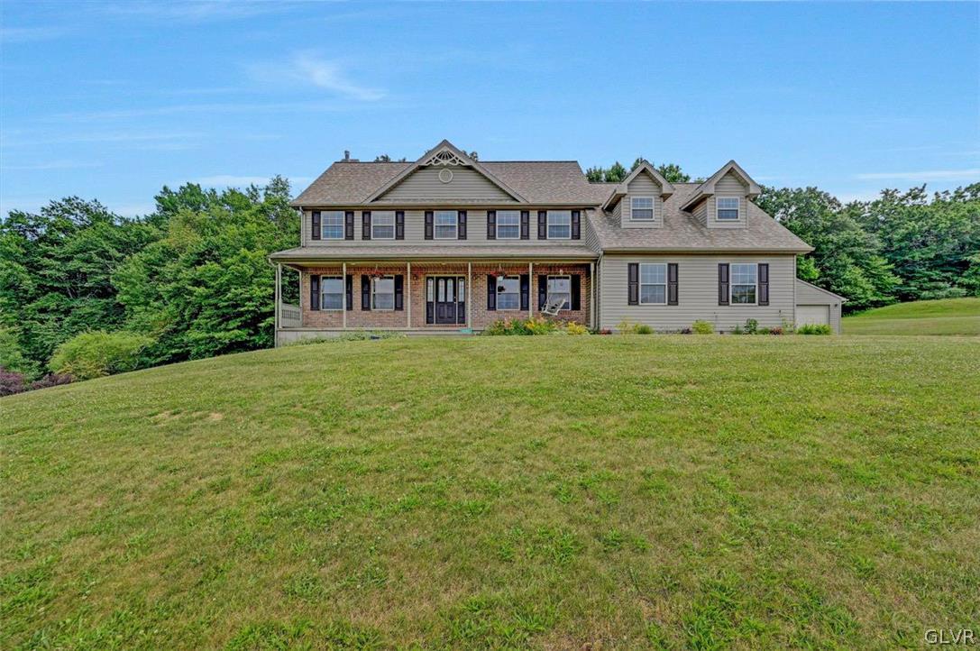 2242 Hill Road Effort, PA 18330 - Photo 1 of 50 front view of a house with a garden