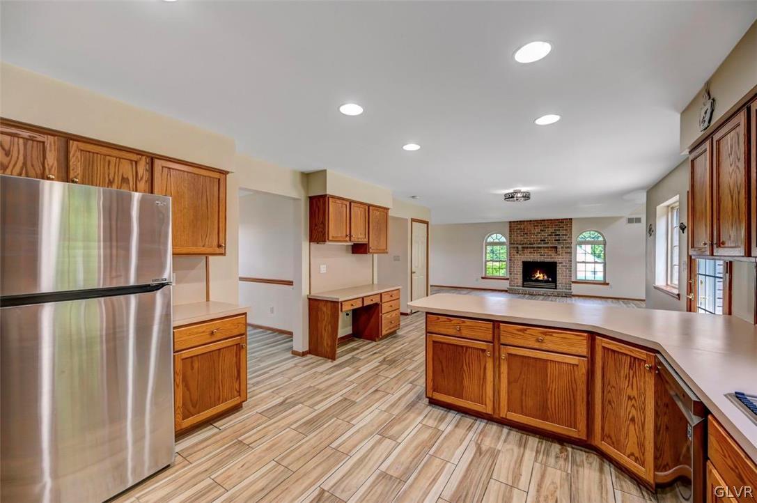 2242 Hill Road Effort, PA 18330 - Photo 11 of 50 a kitchen with stainless steel appliances a refrigerator and a stove top oven