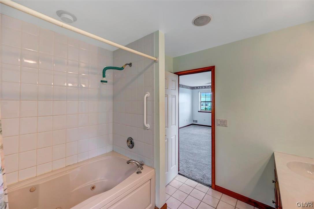 2242 Hill Road Effort, PA 18330 - Photo 21 of 50 a bathroom with a bathtub and a shower