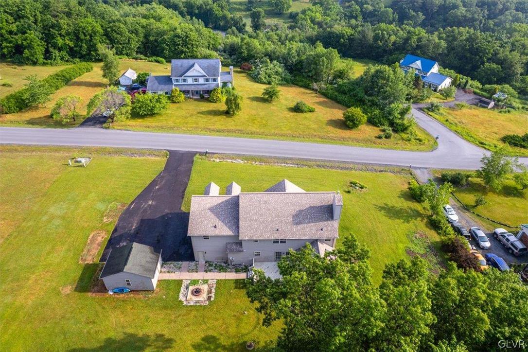 2242 Hill Road Effort, PA 18330 - Photo 49 of 50 an aerial view of a house with swimming pool and outdoor seating