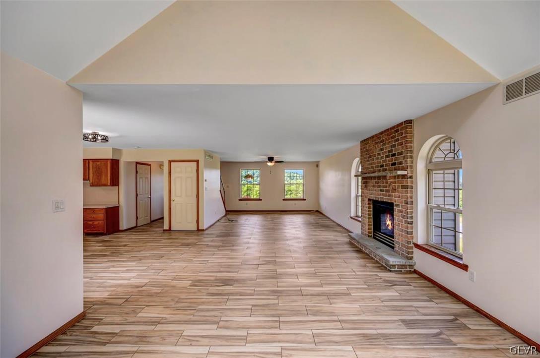 2242 Hill Road Effort, PA 18330 - Photo 6 of 50 a view of an empty room with window and fireplace