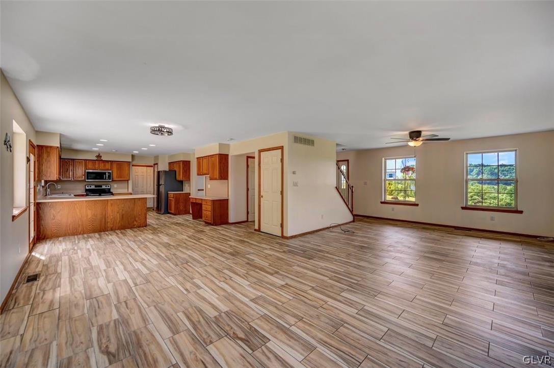 2242 Hill Road Effort, PA 18330 - Photo 8 of 50 a view of a living room hardwood floor and a kitchen