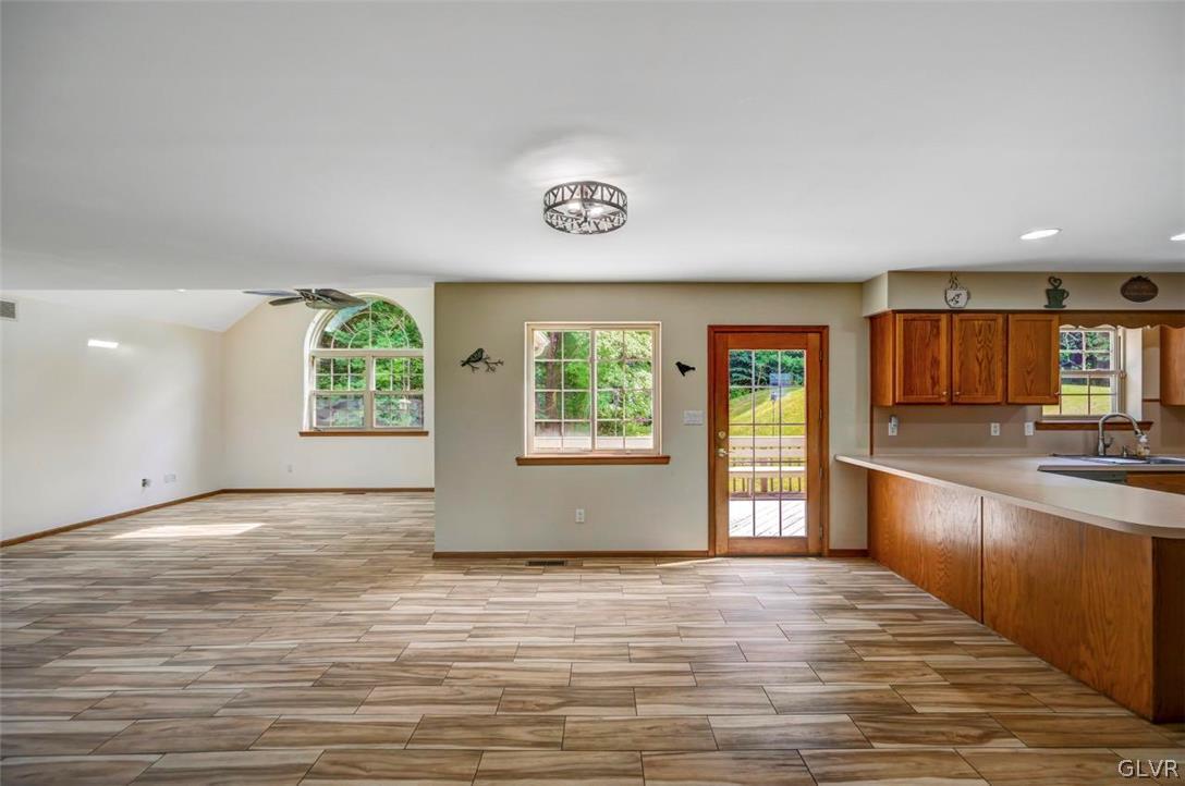 2242 Hill Road Effort, PA 18330 - Photo 10 of 50 an empty room with wooden floor and windows