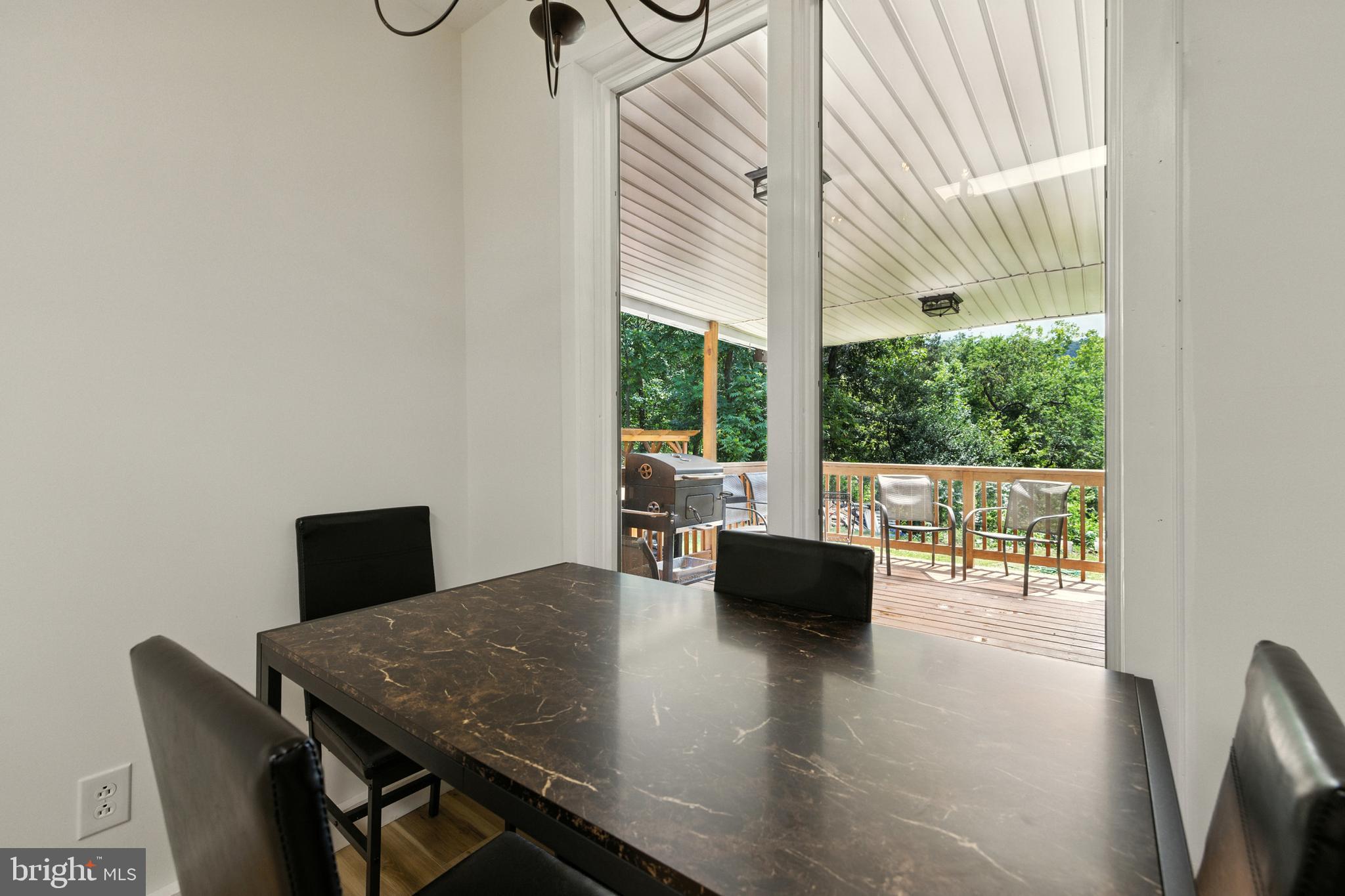 114 Americana Road Luray, VA 22835 - Photo 13 of 67 a view of a dining room with furniture window and outside view