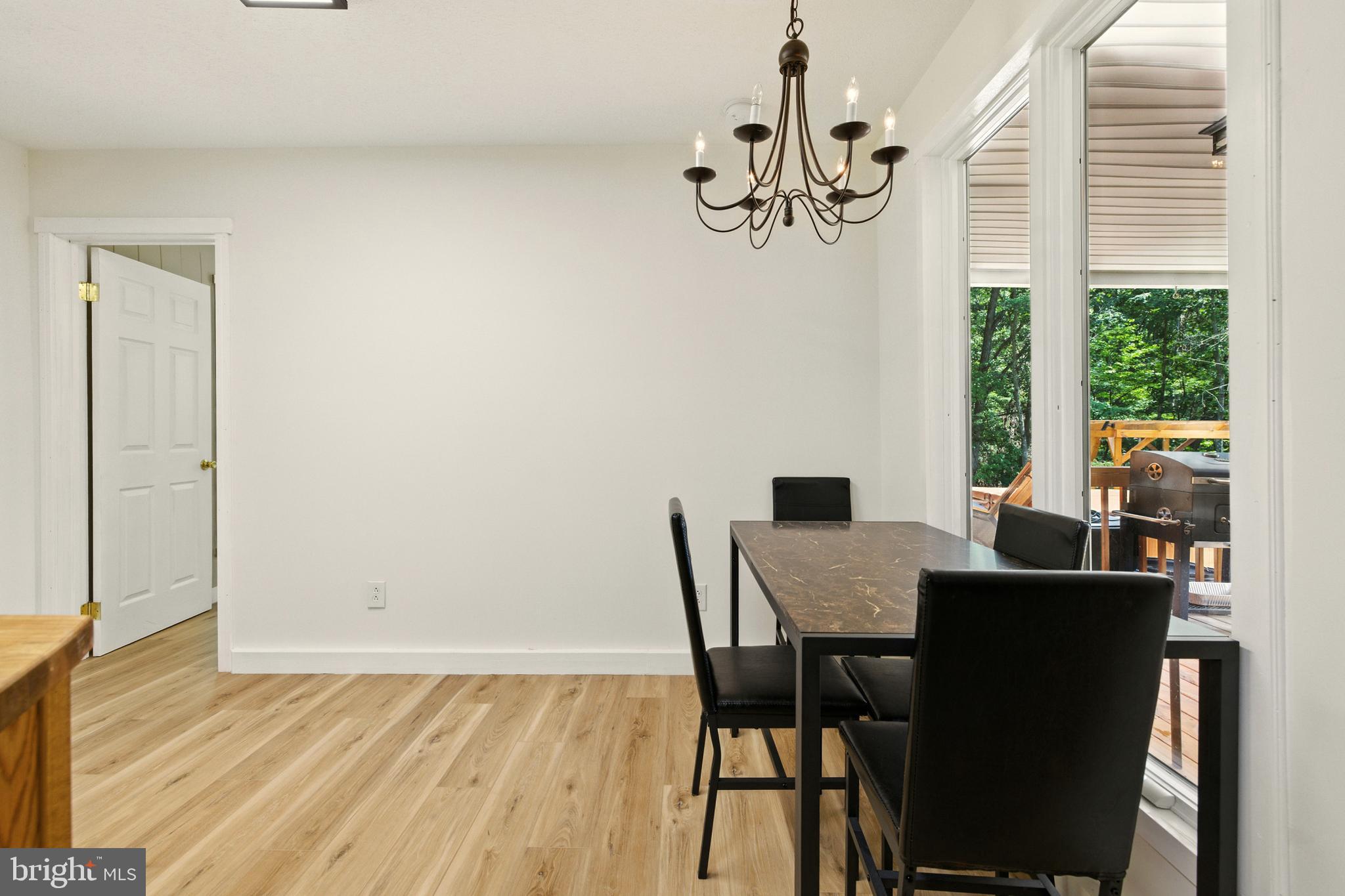 114 Americana Road Luray, VA 22835 - Photo 21 of 67 a view of a dining room with furniture window and outside view