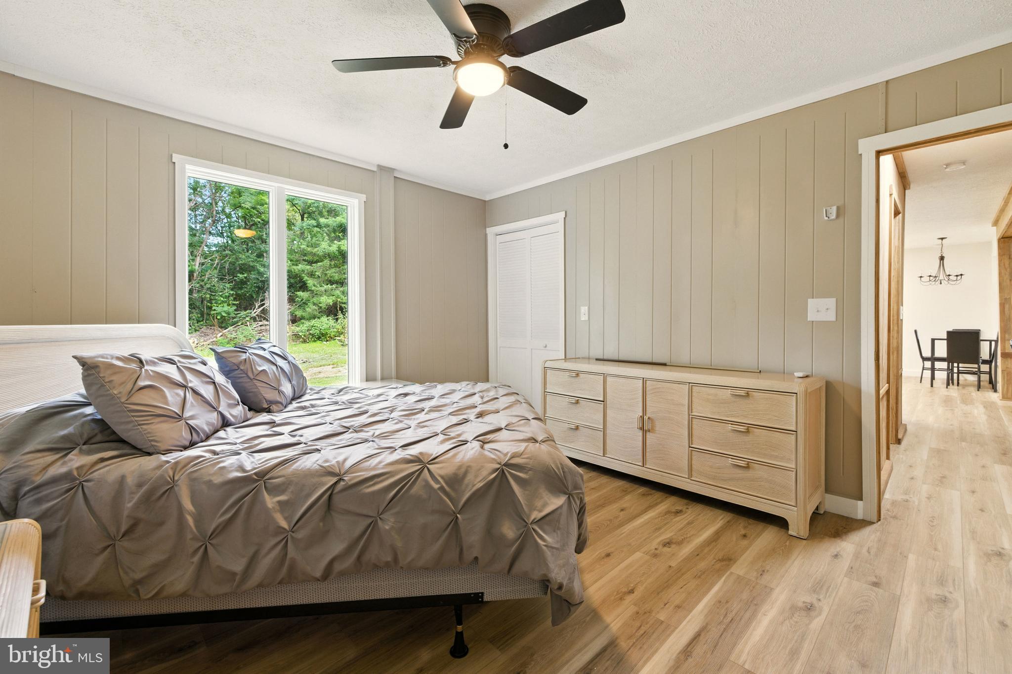 114 Americana Road Luray, VA 22835 - Photo 23 of 67 a bedroom with a bed and a dresser