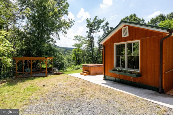 a view of a backyard with a garden