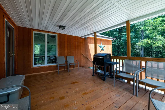 an aerial view of a house with mountain view