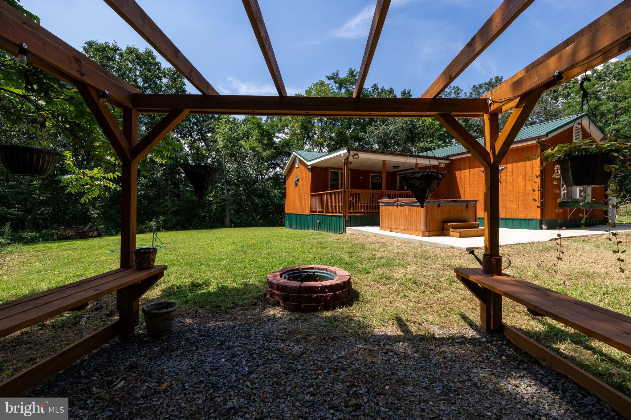 114 Americana Road Luray, VA 22835 - Photo 50 of 67 a view of a backyard with a garden
