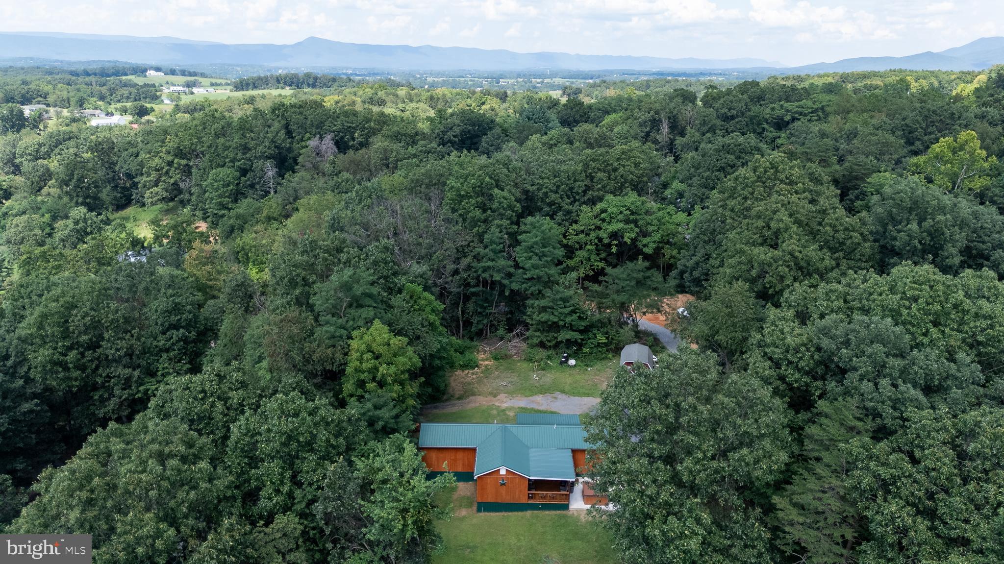 114 Americana Road Luray, VA 22835 - Photo 55 of 67 an aerial view of a house with a yard