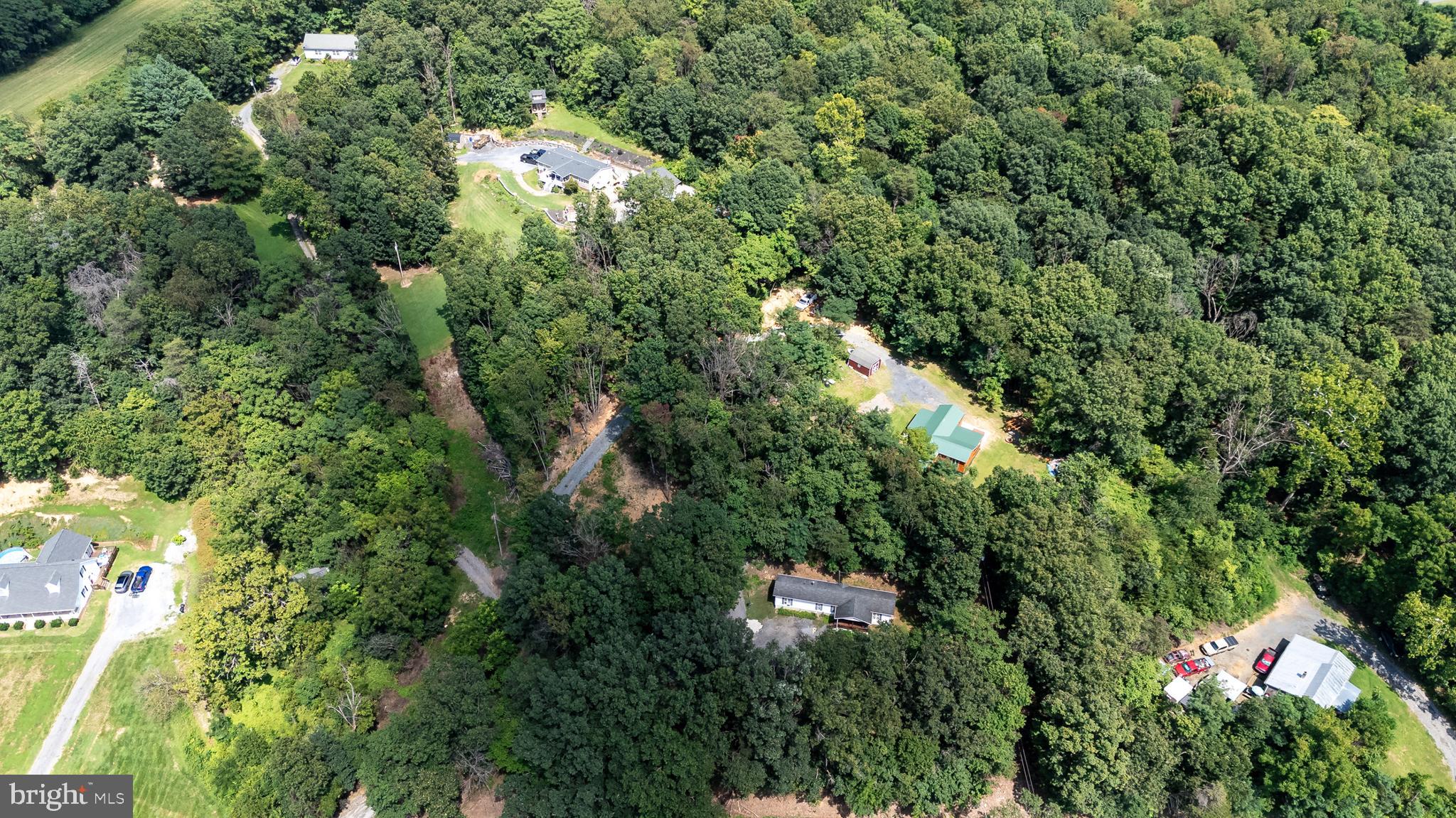 114 Americana Road Luray, VA 22835 - Photo 58 of 67 an aerial view of residential house with yard and outdoor space