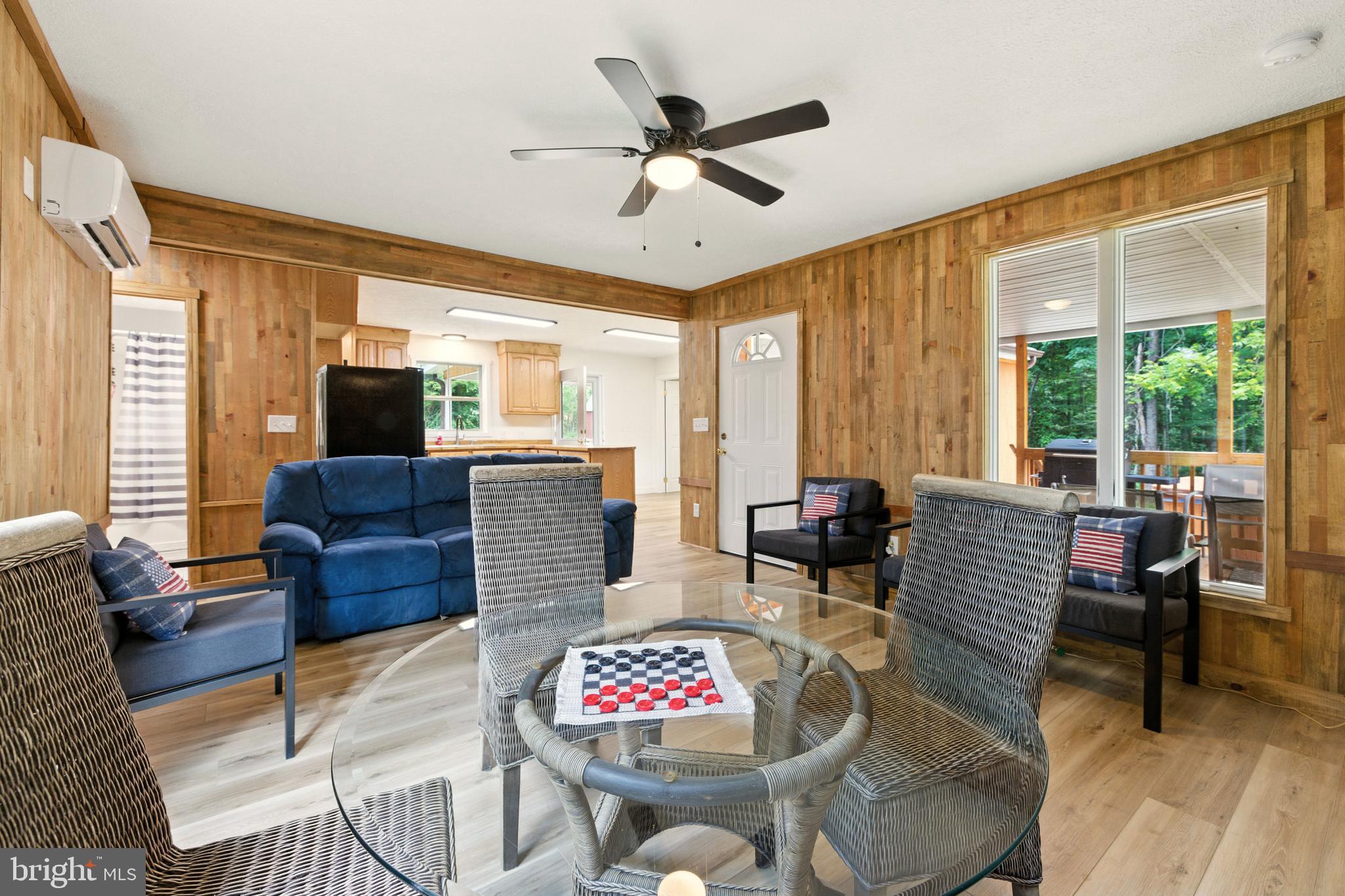 114 Americana Road Luray, VA 22835 - Photo 7 of 67 a living room with furniture and a large window