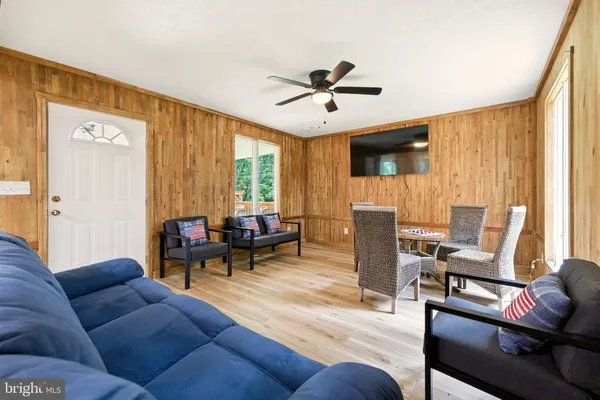 a kitchen with a sink stove top oven and cabinets