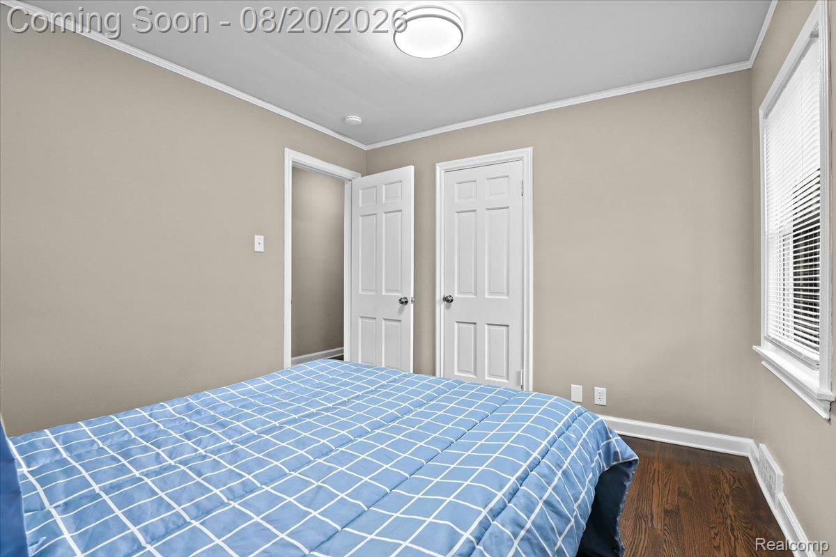 429 Moran Road Grosse Pointe, MI 48236 - Photo 25 of 36 Hardwood-style flooring, neutral wall paint, white trim, recessed lighting, and a window with blinds