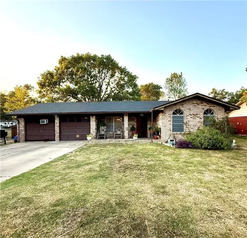 a house view with a garden space