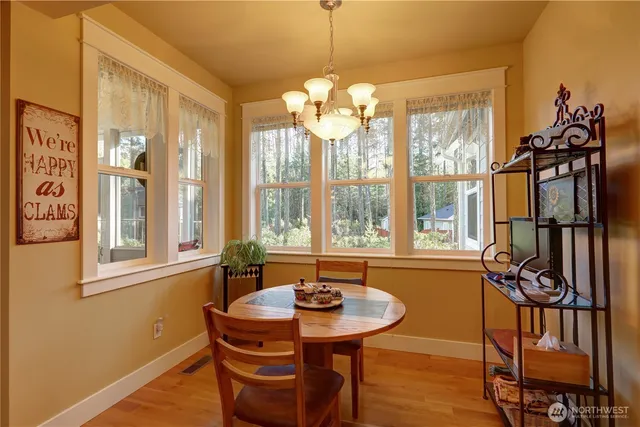 a view of a livingroom with furniture and window
