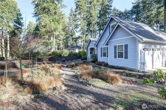 a building outdoor space with patio furniture and potted plants