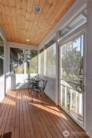 a living room with large windows