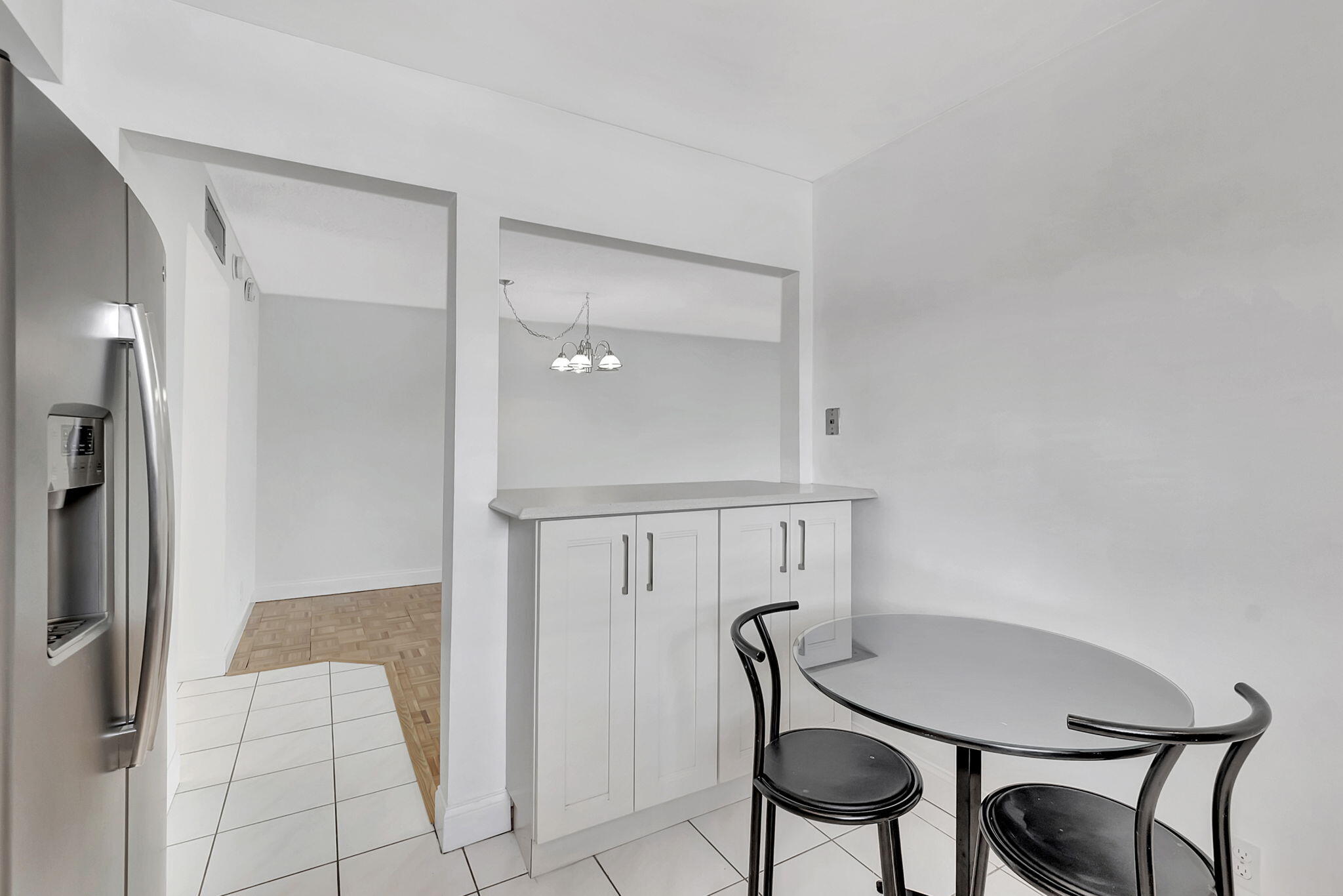 124 Capri B Delray Beach, FL 33484 - Photo 17 of 69 a view of a room with furniture and wooden floor
