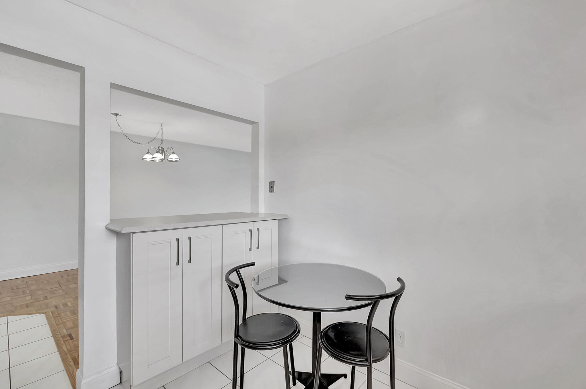 124 Capri B Delray Beach, FL 33484 - Photo 18 of 69 a view of a room with furniture and wooden floor