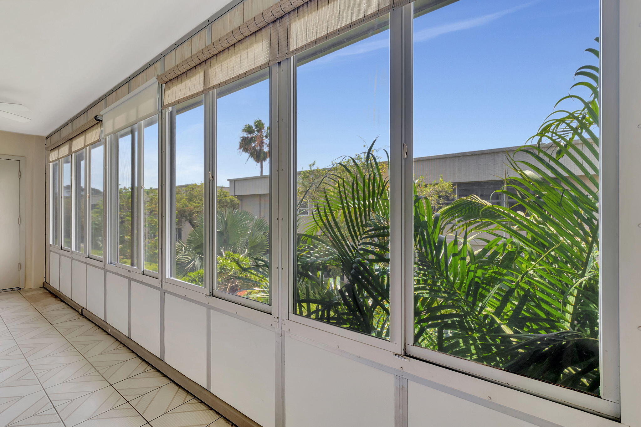124 Capri B Delray Beach, FL 33484 - Photo 30 of 69 a view of a balcony with plants
