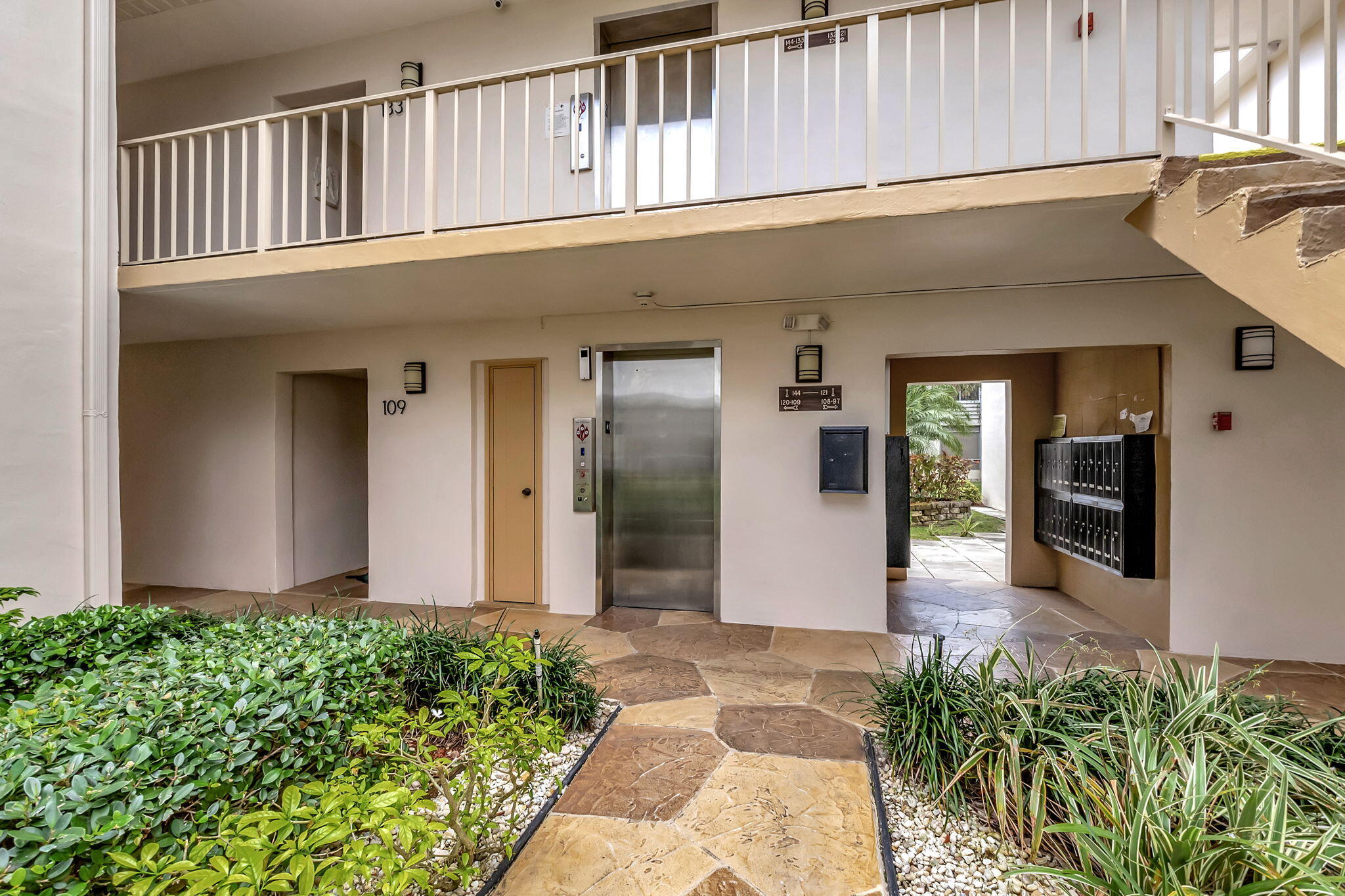 124 Capri B Delray Beach, FL 33484 - Photo 5 of 69 a view of a building with potted plants