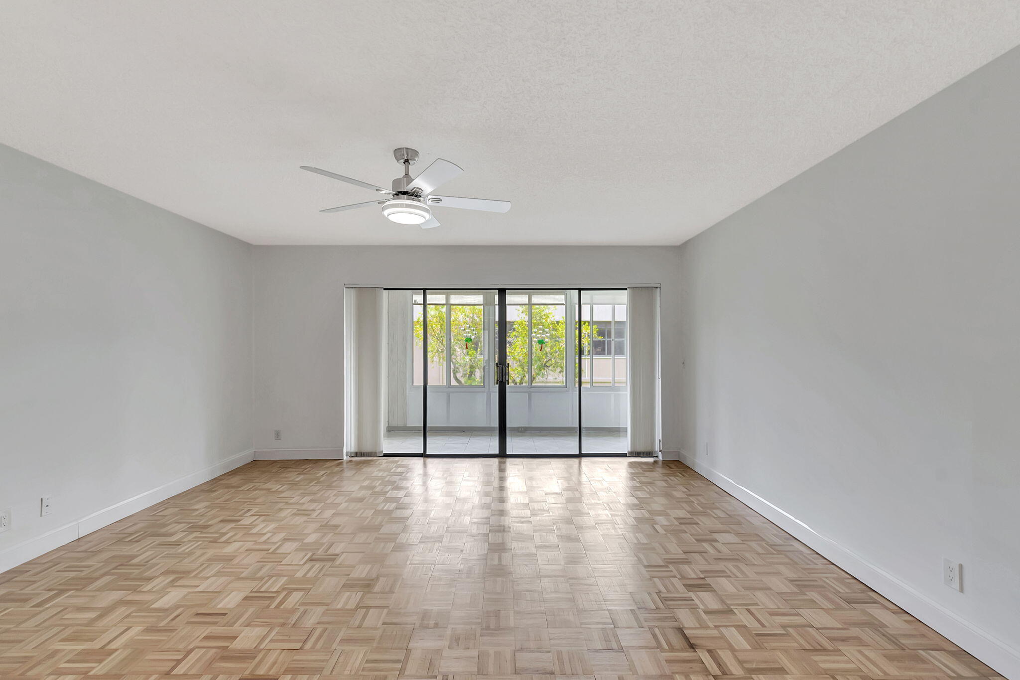 124 Capri B Delray Beach, FL 33484 - Photo 10 of 69 a view of an empty room with a window