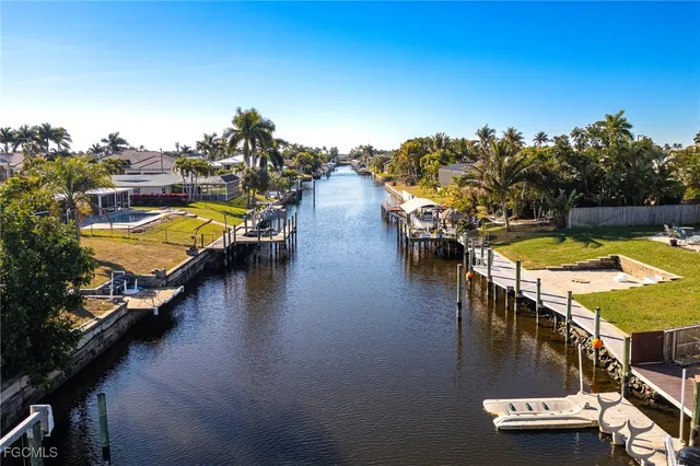 a view of a swimming pool with seating area