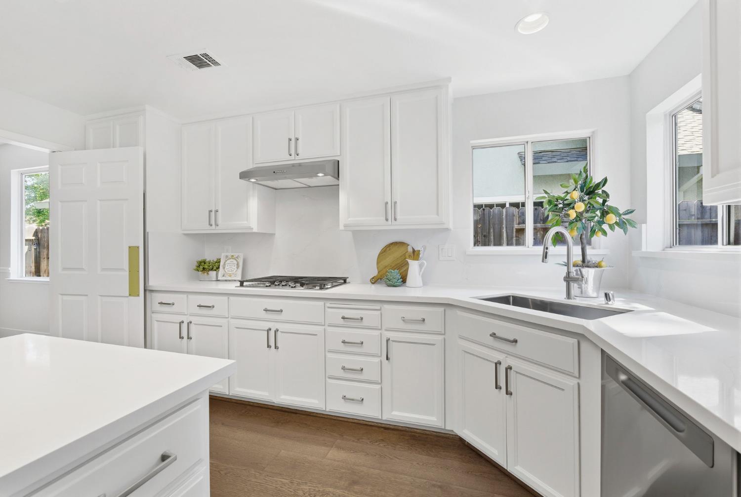 3718 Maidu Place Davis, CA 95618 - Photo 16 of 50 a kitchen with cabinets appliances and a sink