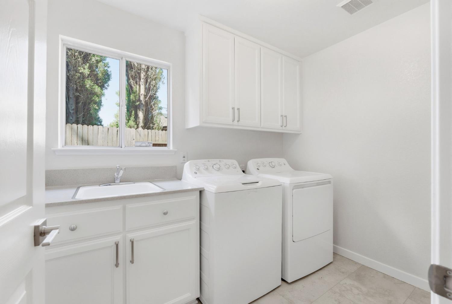 3718 Maidu Place Davis, CA 95618 - Photo 19 of 50 a utility room with dryer and washer