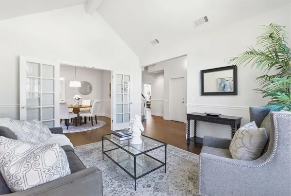 a living room with furniture and a couch