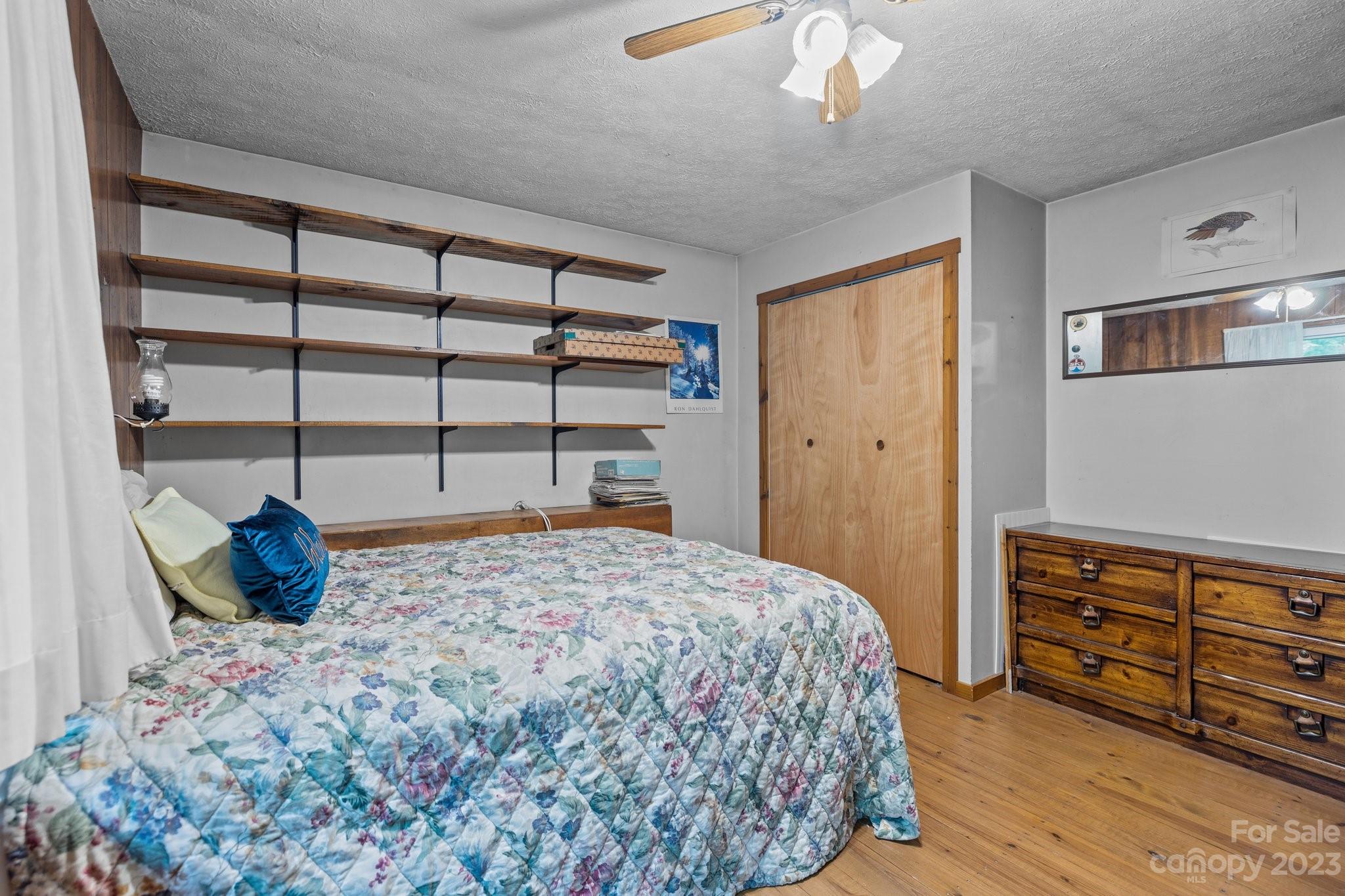 6906 Newman Road Waxhaw, NC 28173 - Photo 15 of 23 a bedroom with a bed and a closet