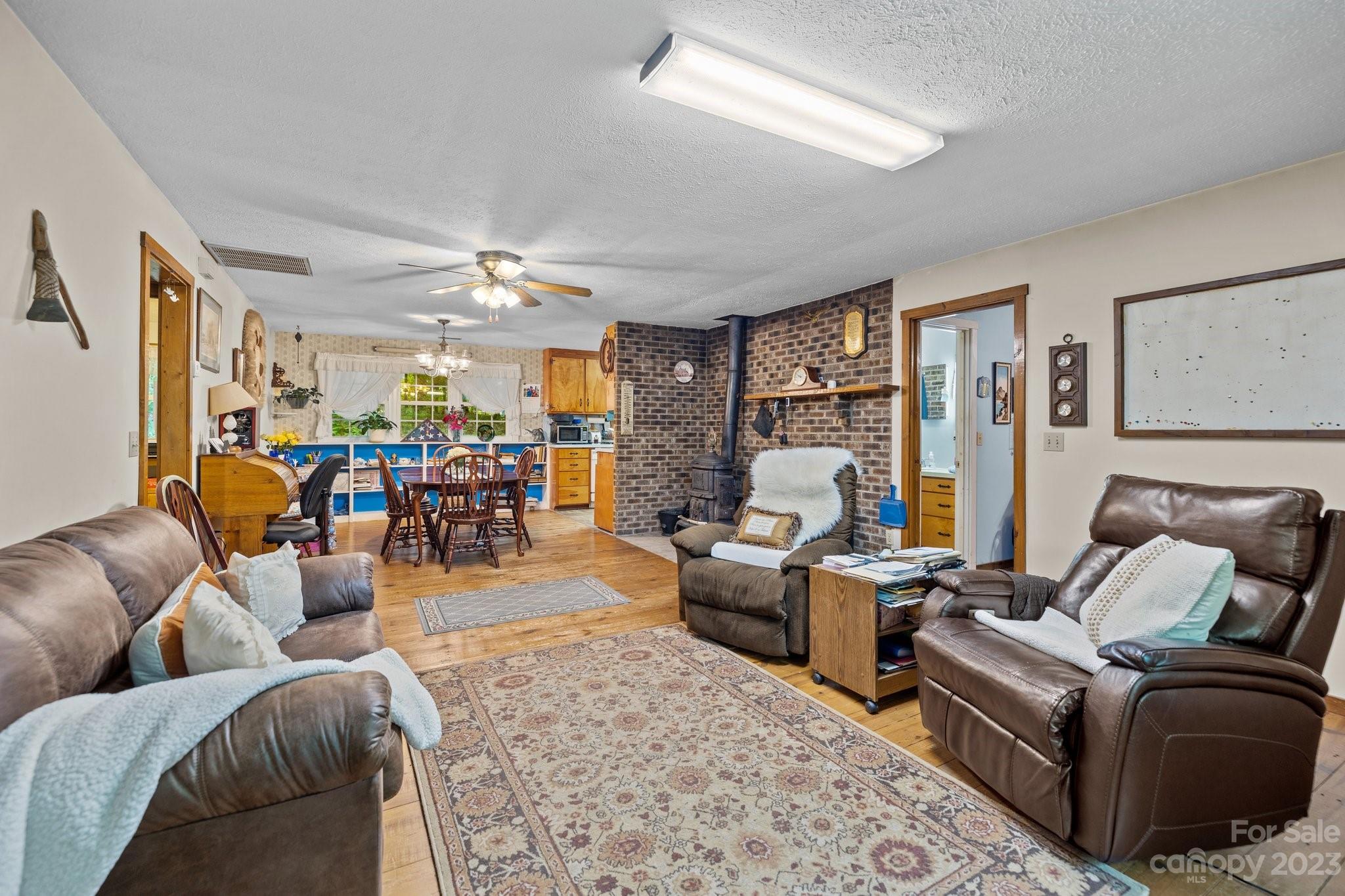 6906 Newman Road Waxhaw, NC 28173 - Photo 8 of 23 a living room with furniture and a large window