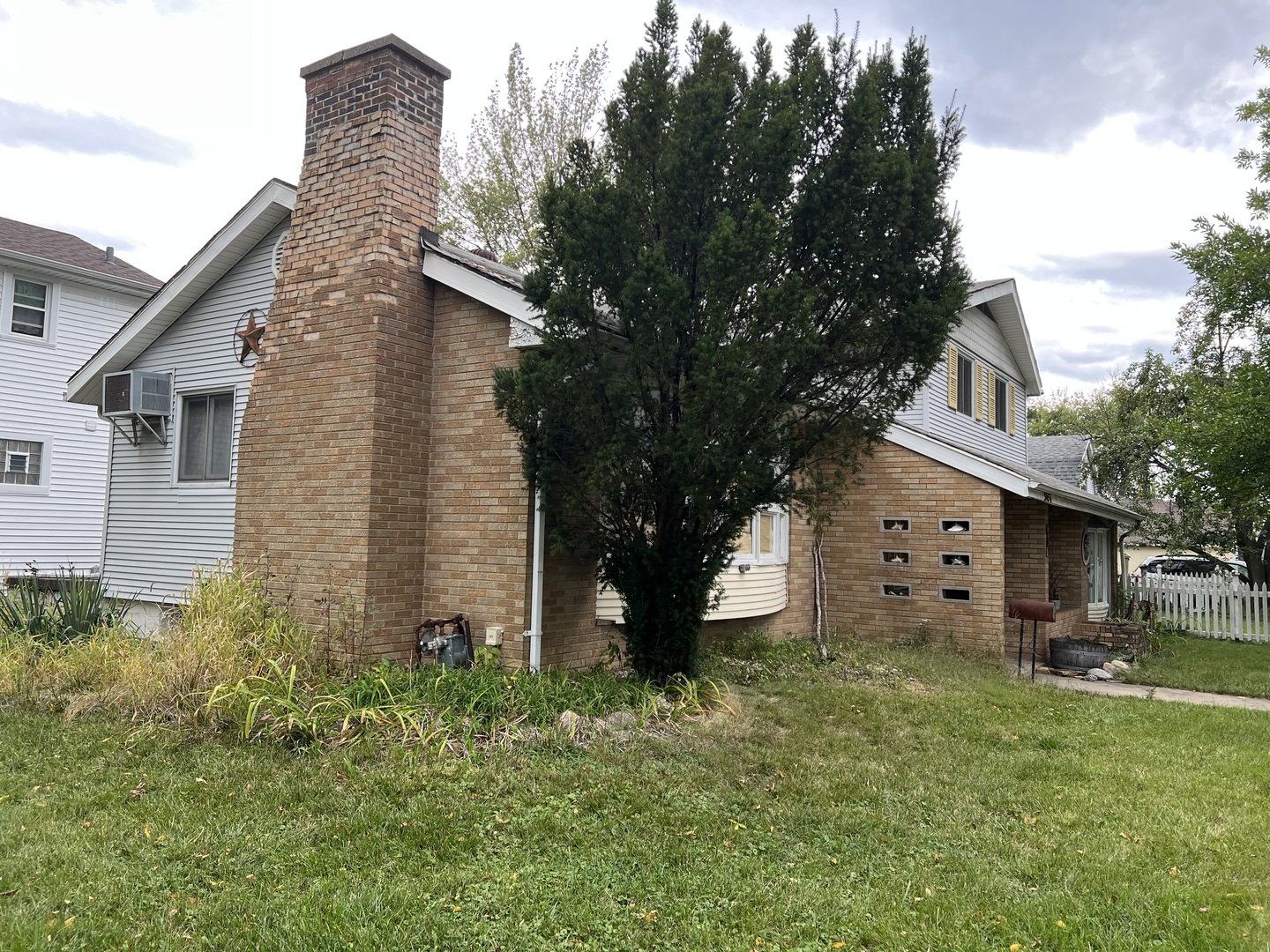 3454 Monroe Street Lansing, IL 60438 - Photo 3 of 4 a view of a house with a backyard