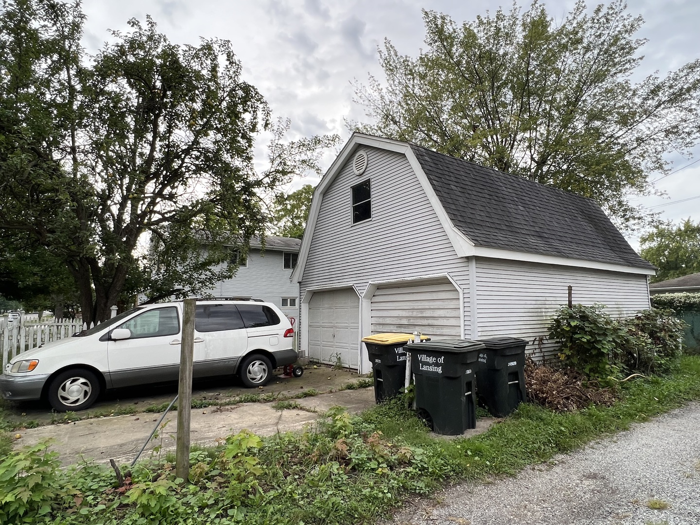 3454 Monroe Street Lansing, IL 60438 - Photo 4 of 4 a view of a car in front of a house