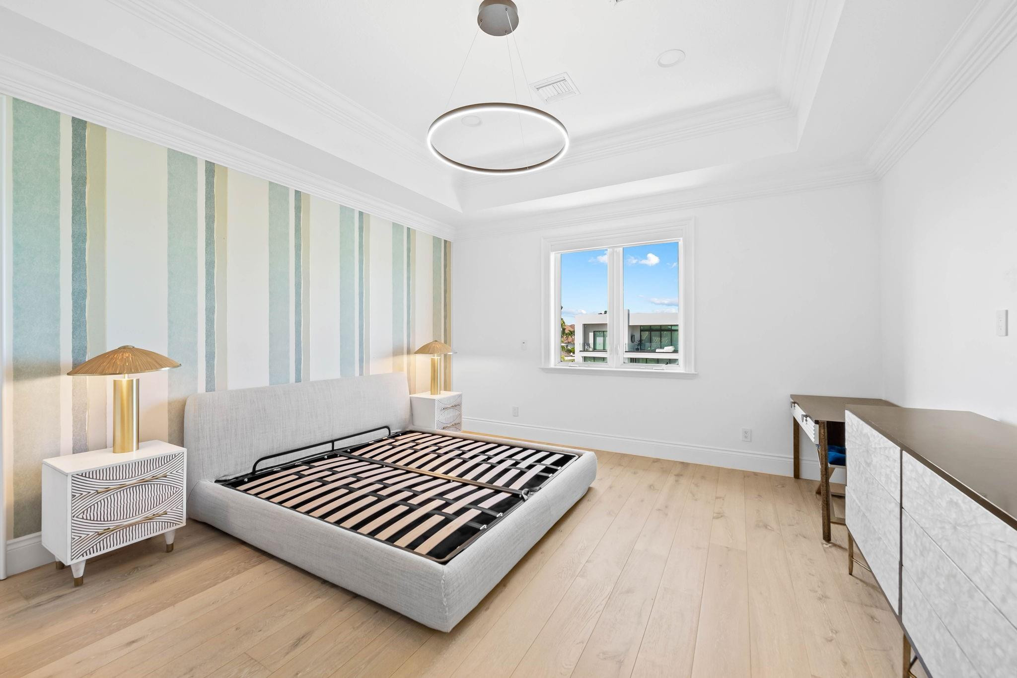 861 Nafa Drive Boca Raton, FL 33487 - Photo 43 of 58 a bedroom with a bed and a window